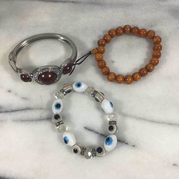 Three Bracelets - 1 Metal Cuff, 1 Wooden Beaded, And 1 Beaded Evil Eye - Picture 1 of 4
